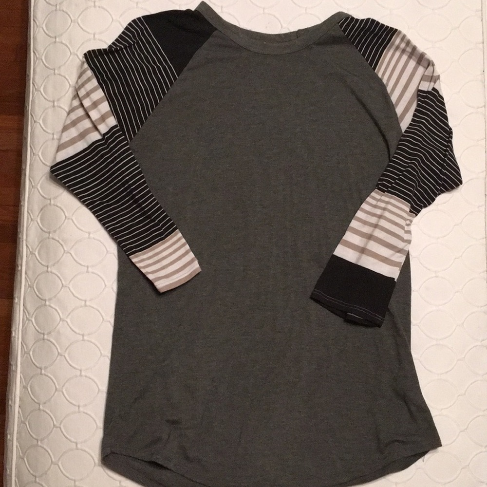LuLaRoe Randy Tee. Medium. Signs of wear.